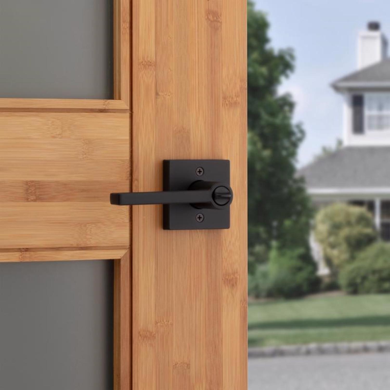 Kwikset Halifax Matte Black Entry Door Knob 2-3/4 in.