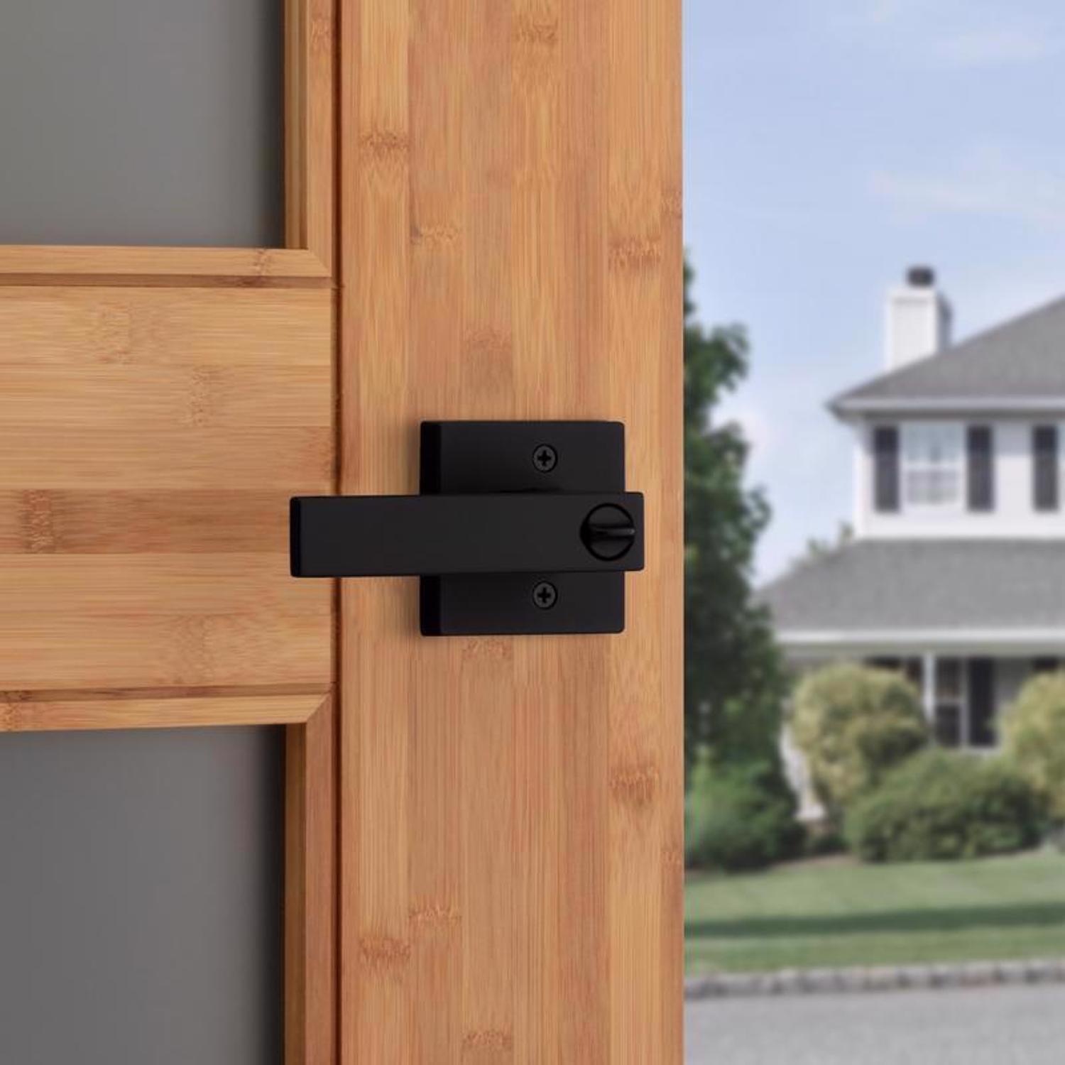 Kwikset Singapore Contemporary Matte Black Entry Door Knob 1-3/4 in.
